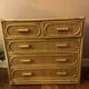 Charming rattan and bamboo chest of drawers.