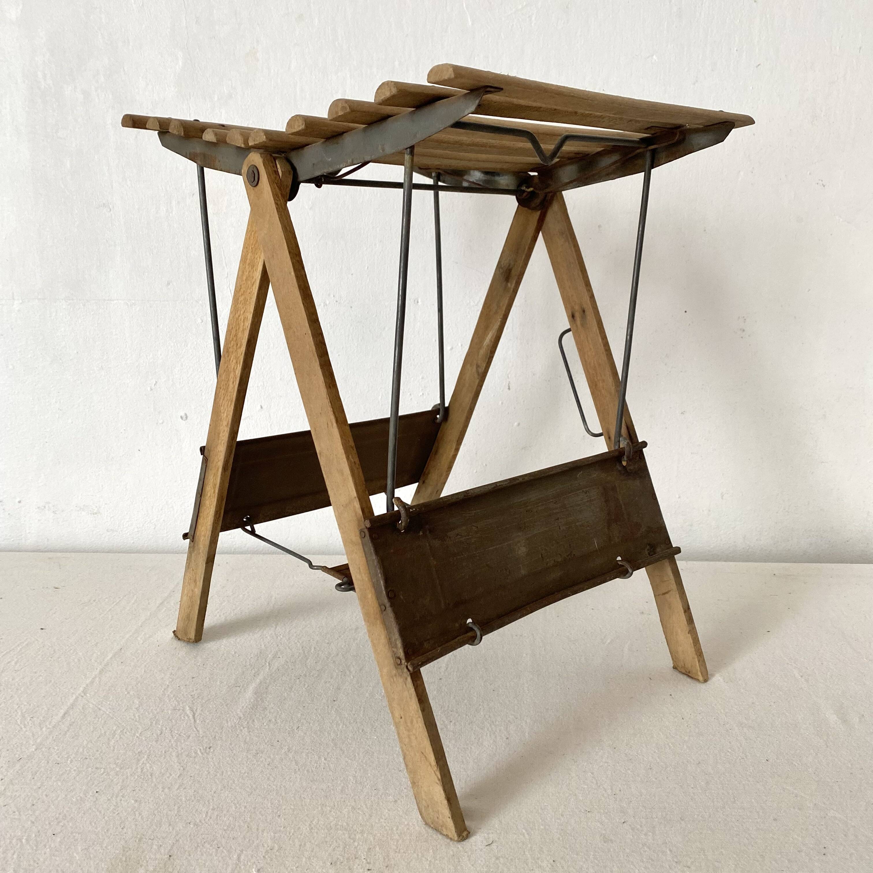 Antique folding stool with slats, plant holder