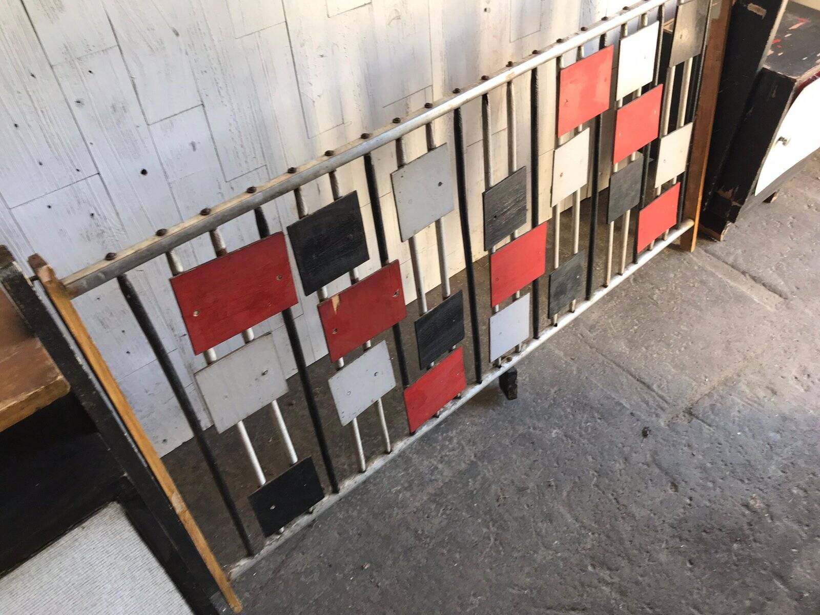 Large vintage 1960s multicoloured wall shelf system made of wood and aluminium.