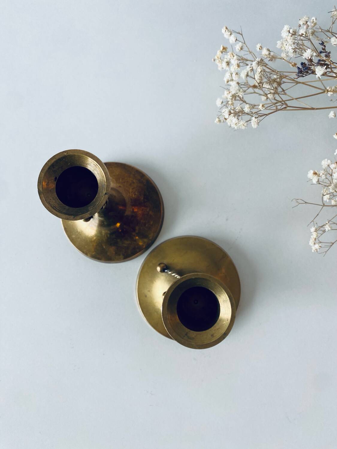 Pair of brass cord candle holders