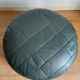 Green patchwork leather pouf from Sède