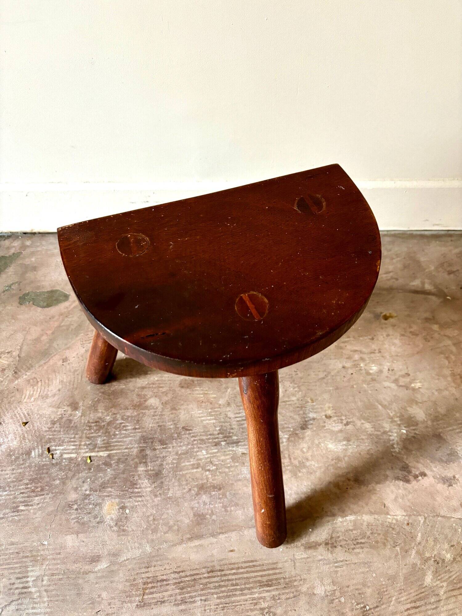 Dark wood tripod stool