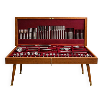 Modernist cutlery set in its wooden cabinet, 130 stainless steel pieces, 1960.
