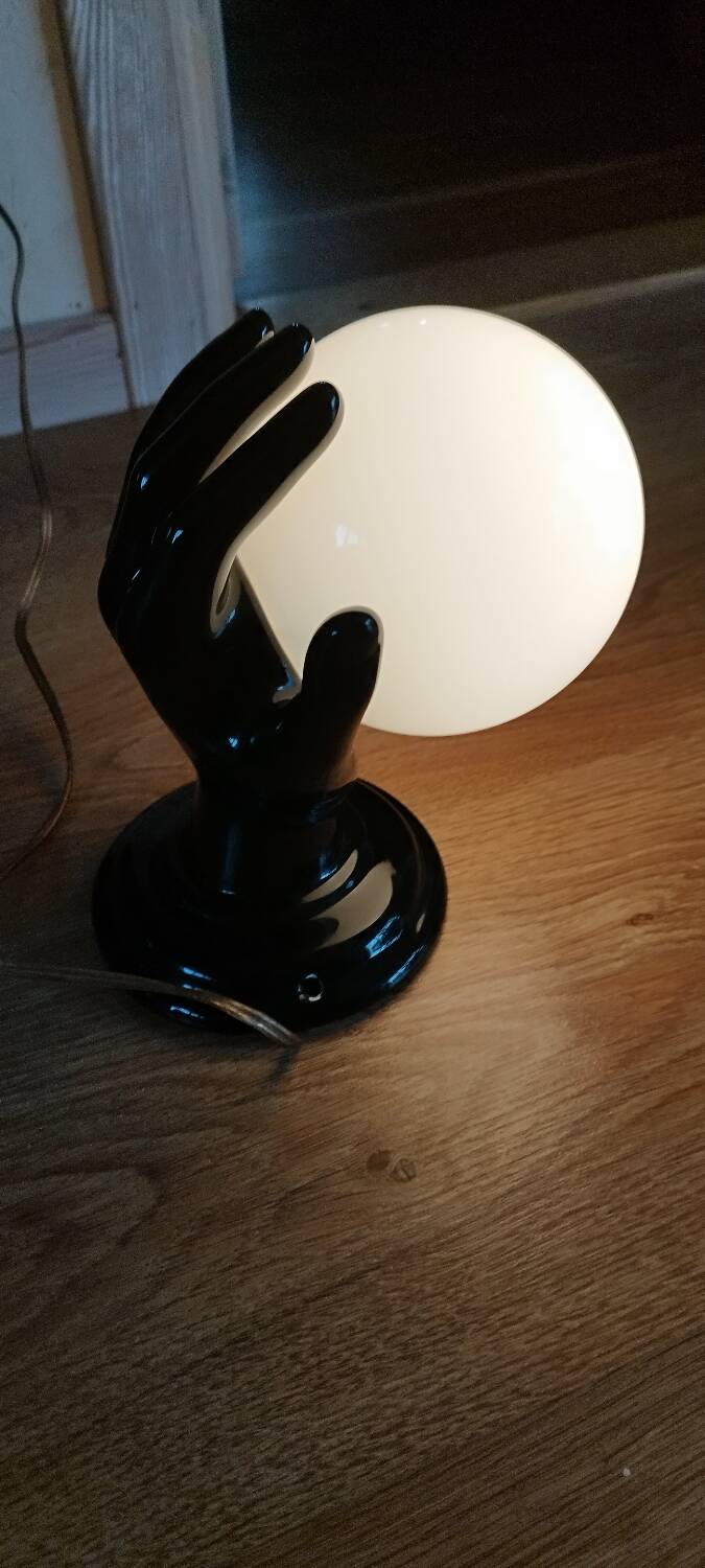 Hand-shaped wall light