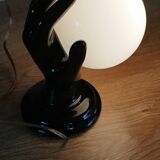 Hand-shaped wall light