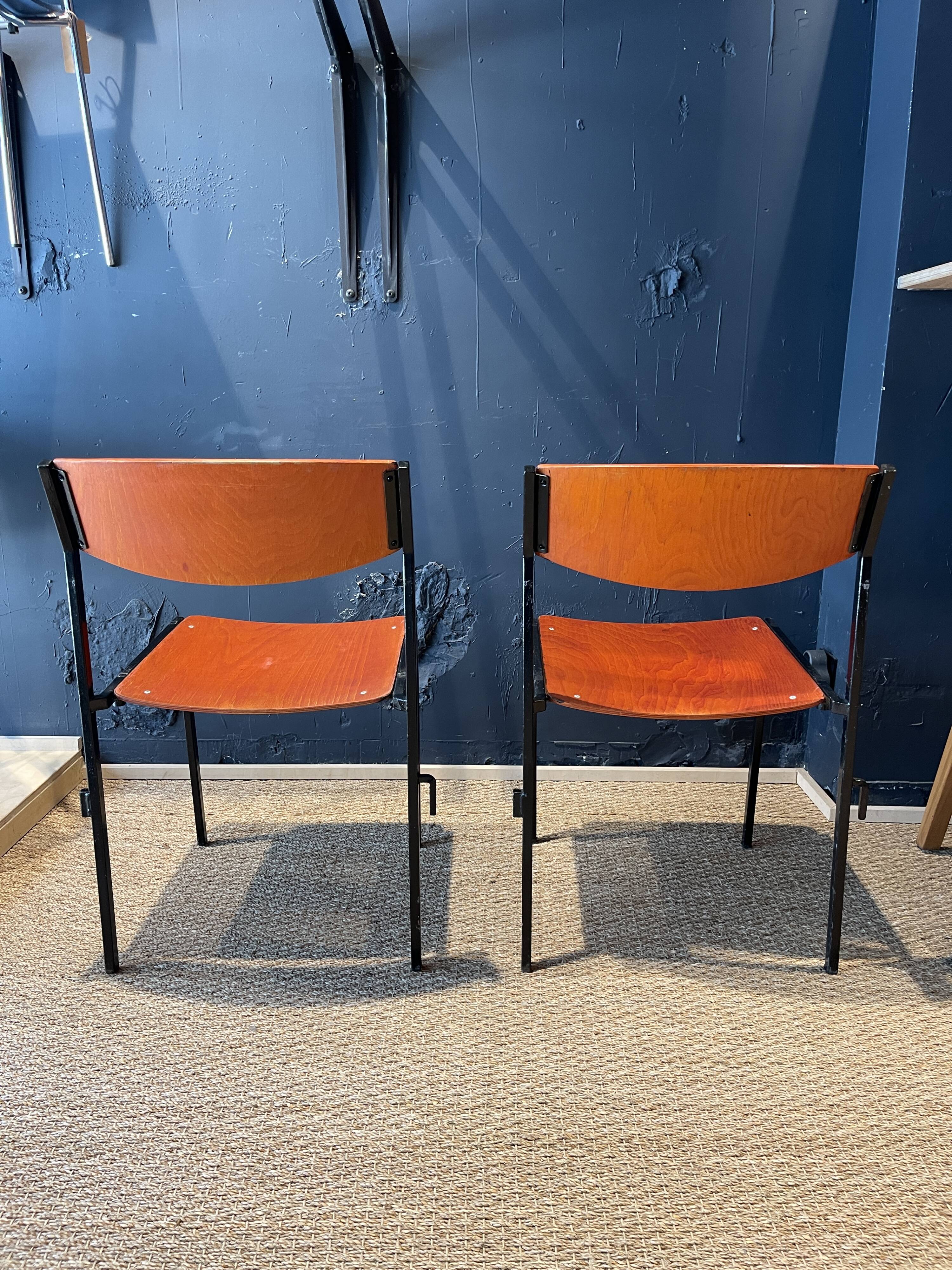 Pair of Gijs Van Der Sluis chairs in orange wood with black legs, Netherlands