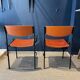 Pair of Gijs Van Der Sluis chairs in orange wood with black legs, Netherlands
