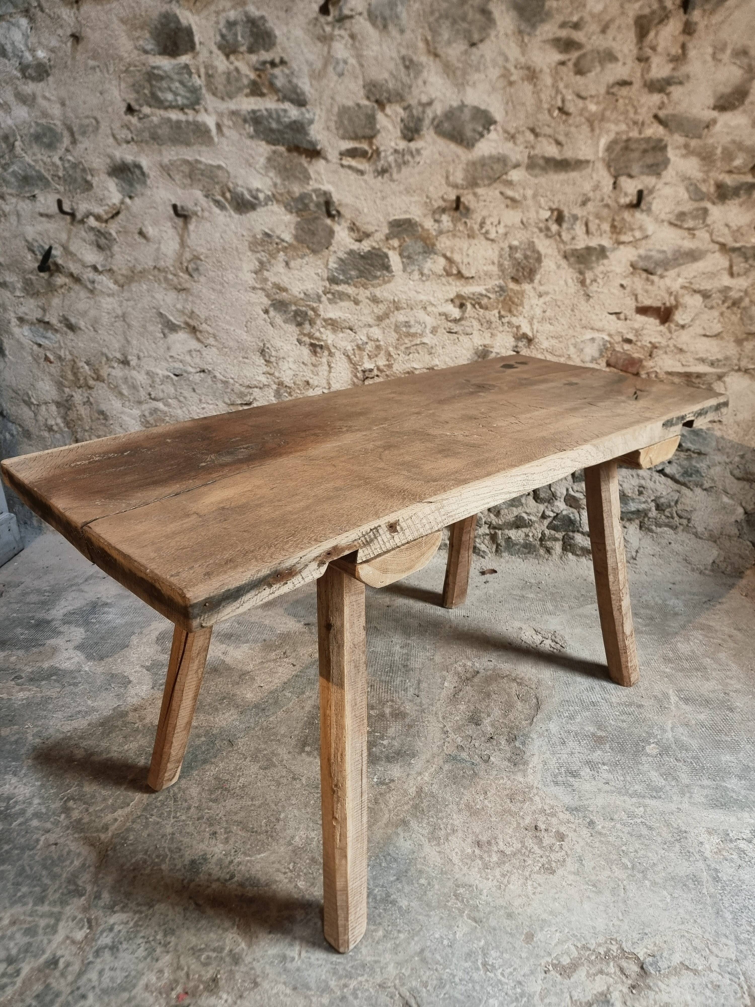 Antique work table / primitive dining table in oak, Hungary, circa 1900–1930.