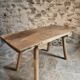 Antique work table / primitive dining table in oak, Hungary, circa 1900–1930.