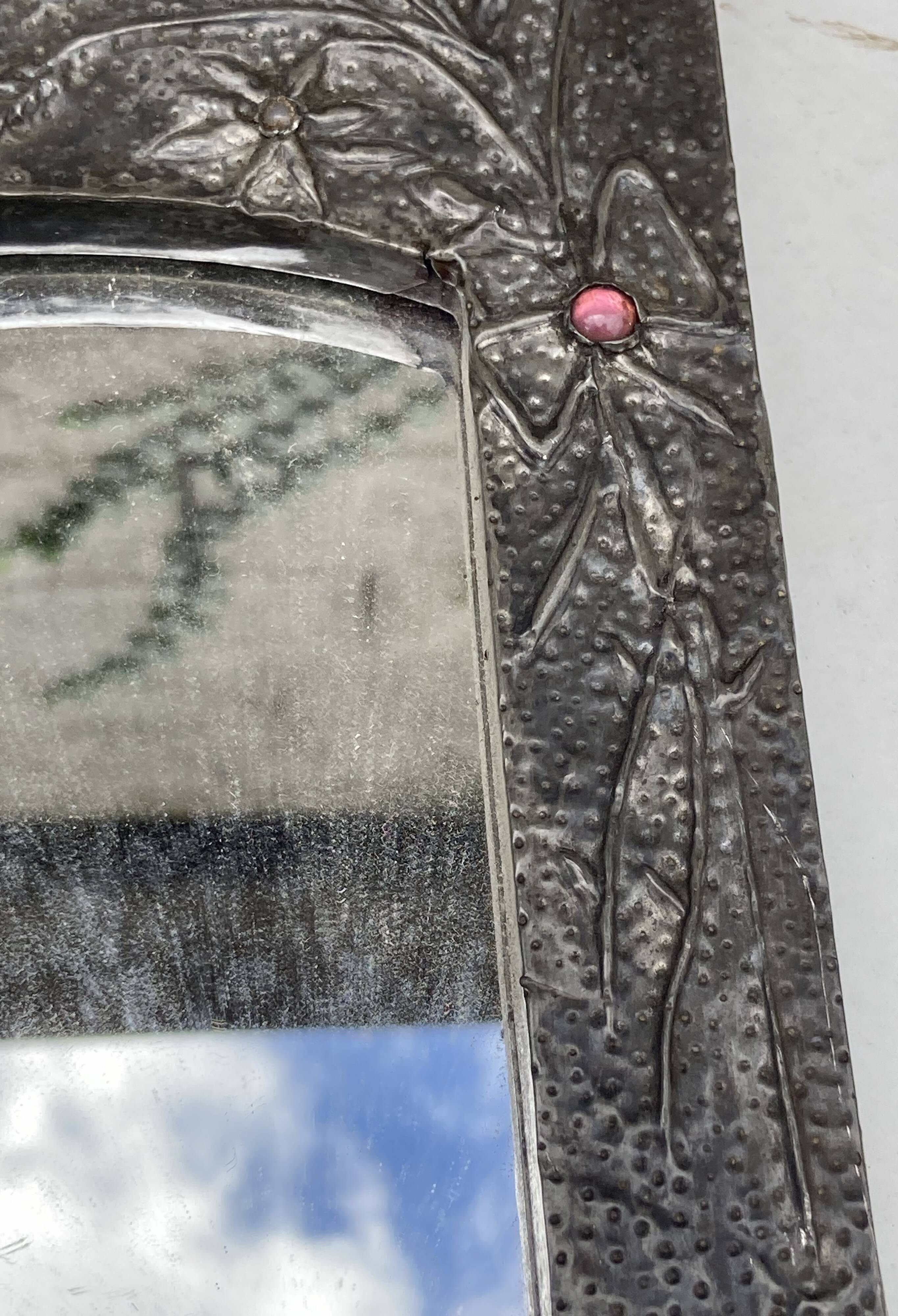 Mirror with embossed metal frame by alfred daguet, 1900s art nouveau period