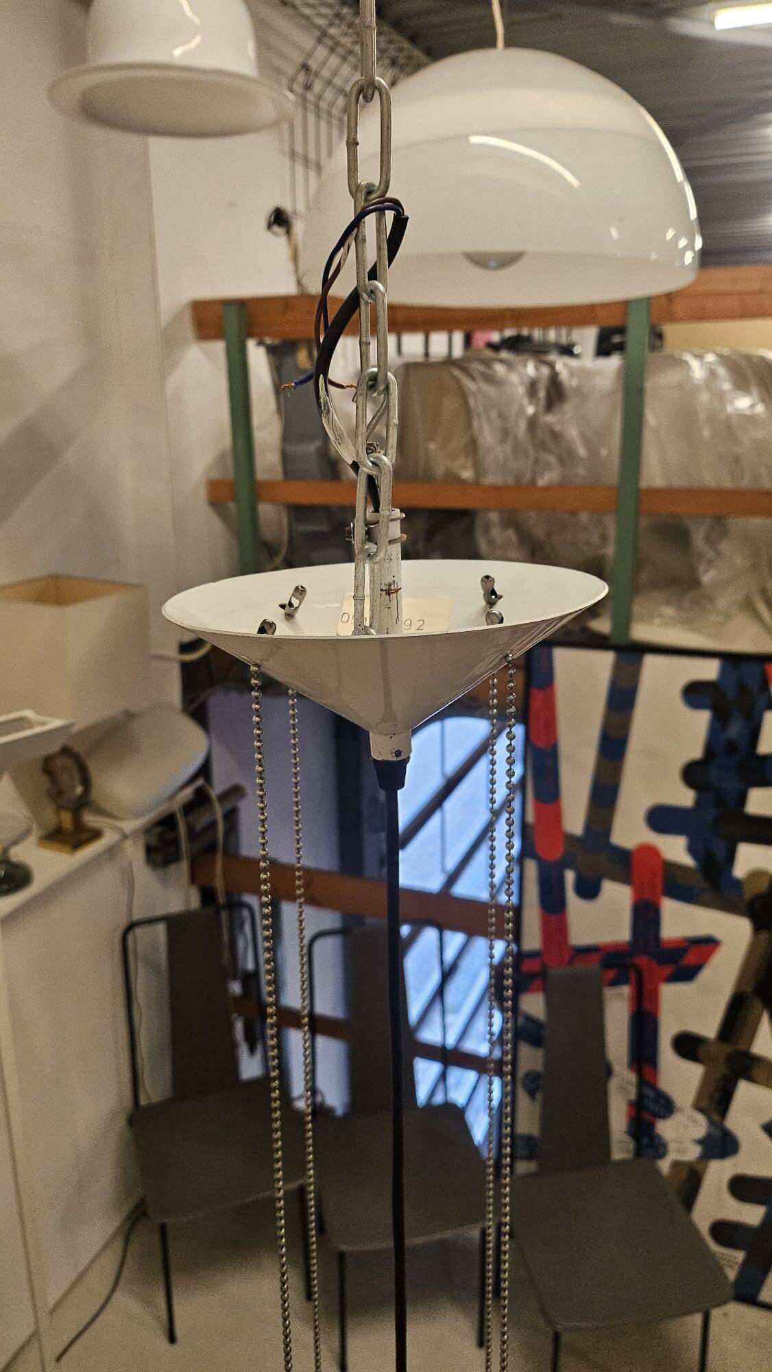 Black plexiglass pendant lamp from the 1980s, mounted on chains, originating from Italy.