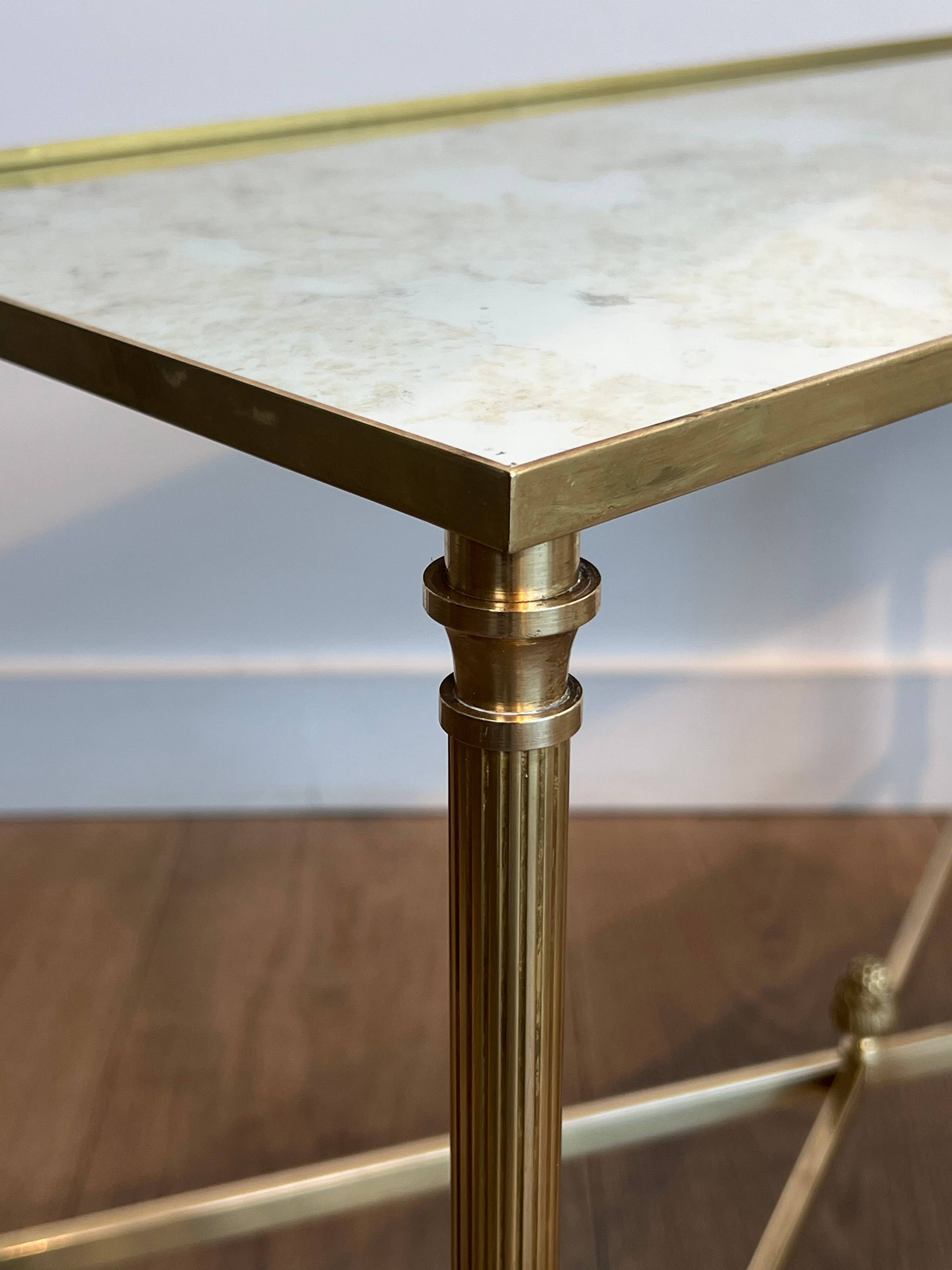 Pair of brass side tables with antique mirrored tops from Maison Jansen