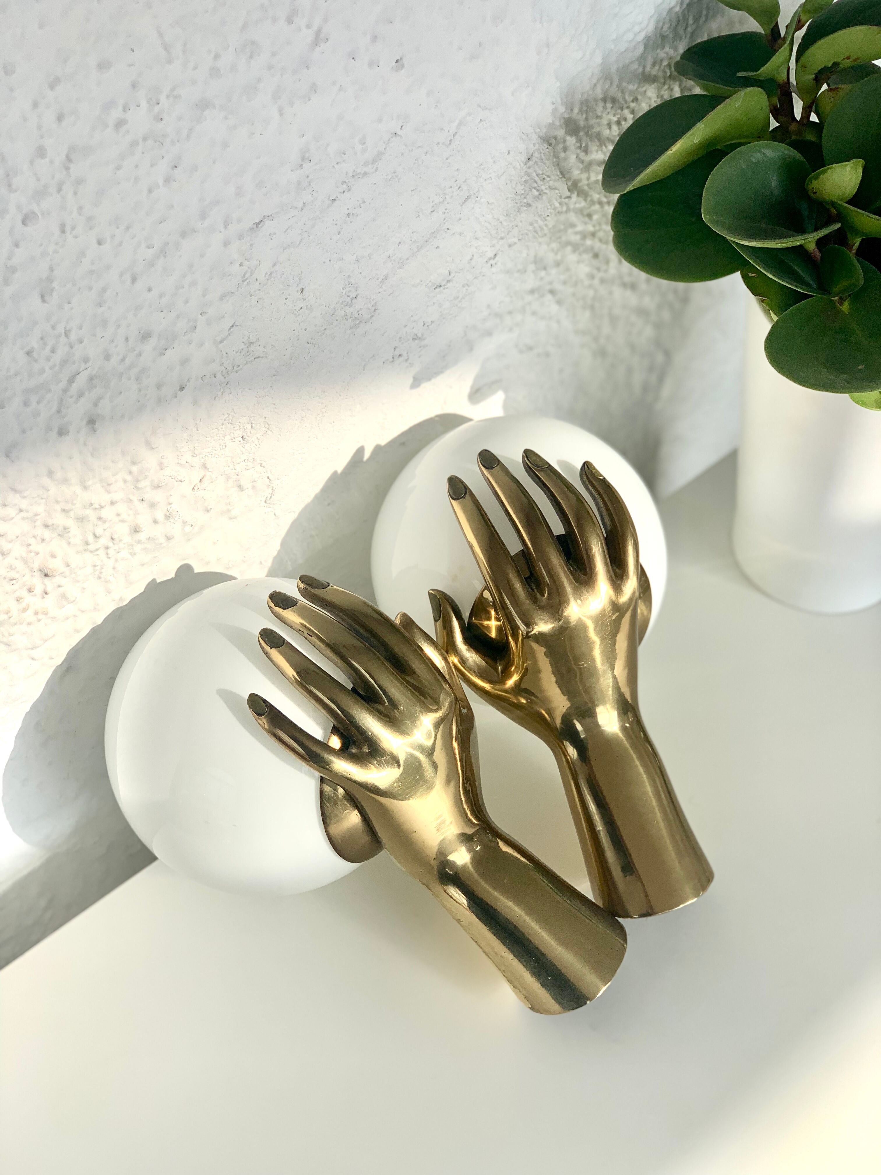 Pair of brass "hands" wall lamps, Arlus 1960