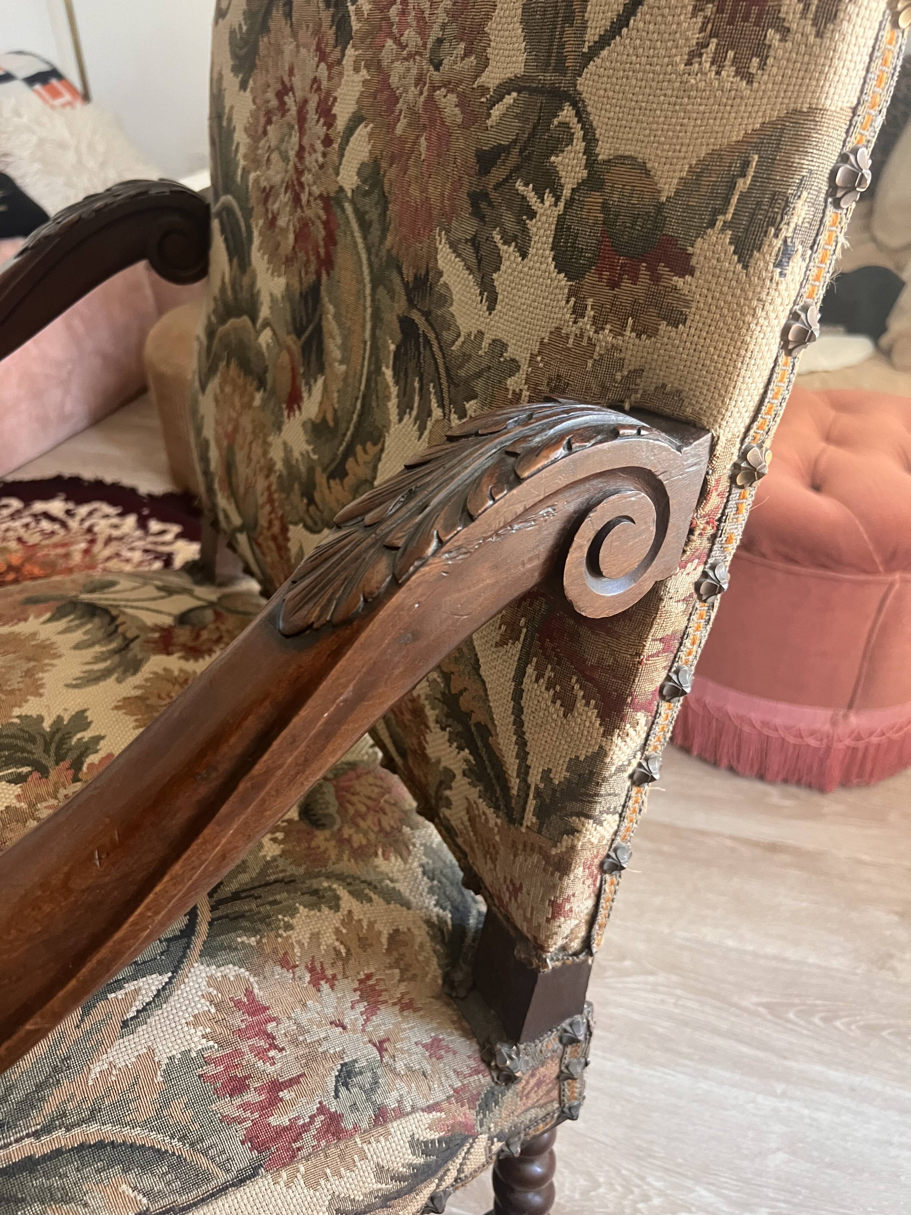 Antique armchair in Henri II style with masks