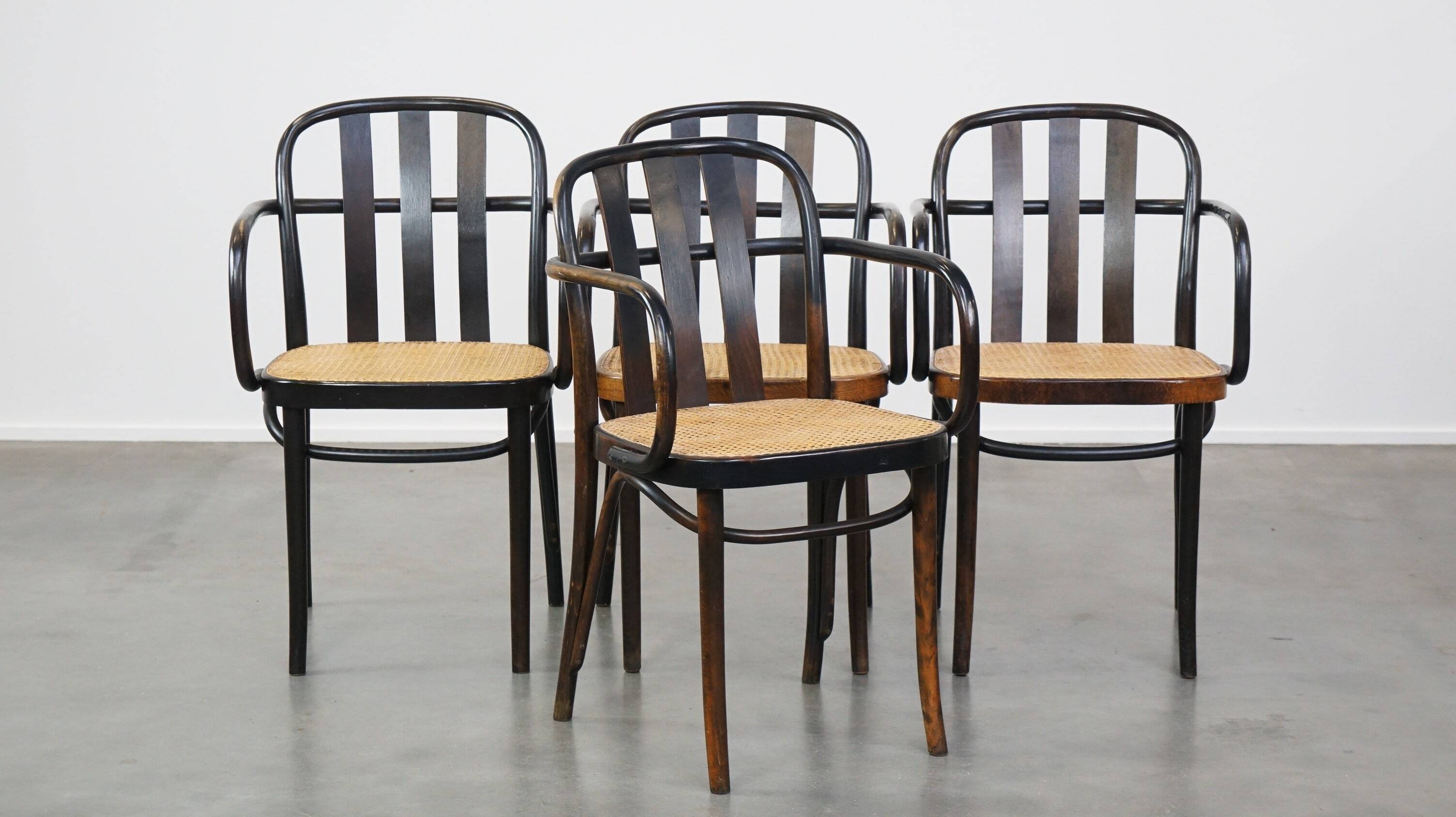 Set of 4 vintage wooden design dining/bistro chairs with woven seats