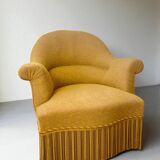Fauteuil crapaud en tissu jaune