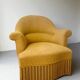 Fauteuil crapaud en tissu jaune