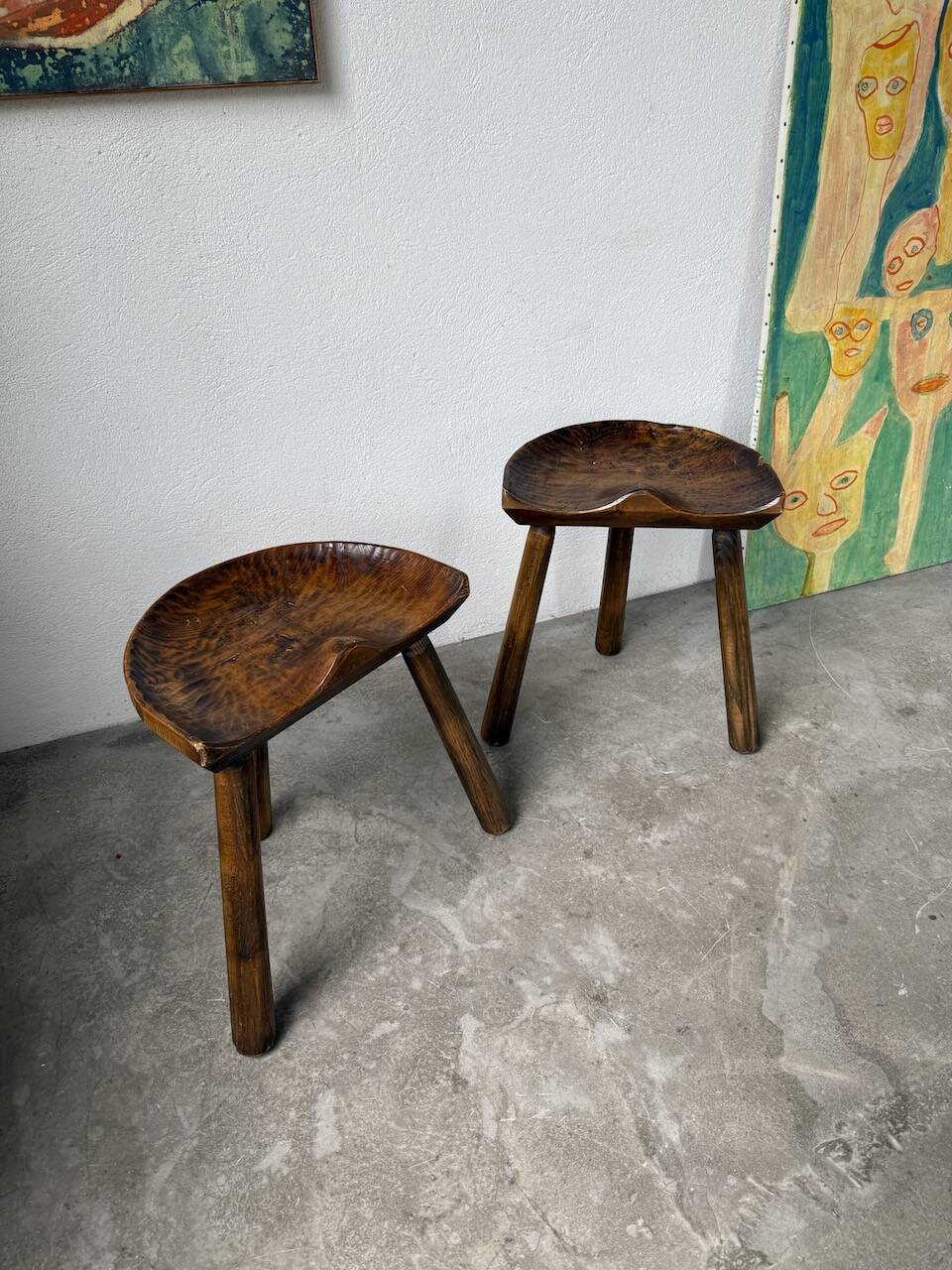Pair of Le Selou tripod shepherd's stools
