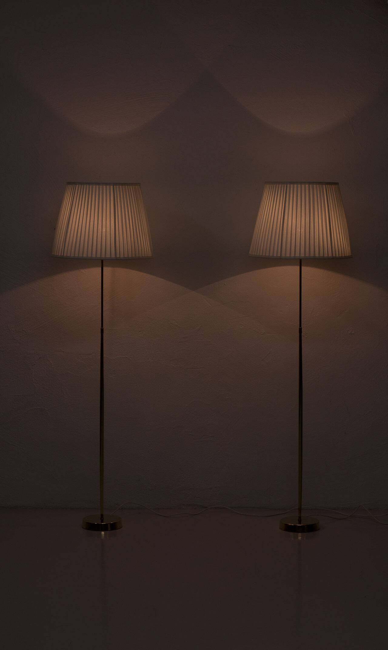 Pair of brass floor lamps by ASEA Belysning, Sweden, 1950s