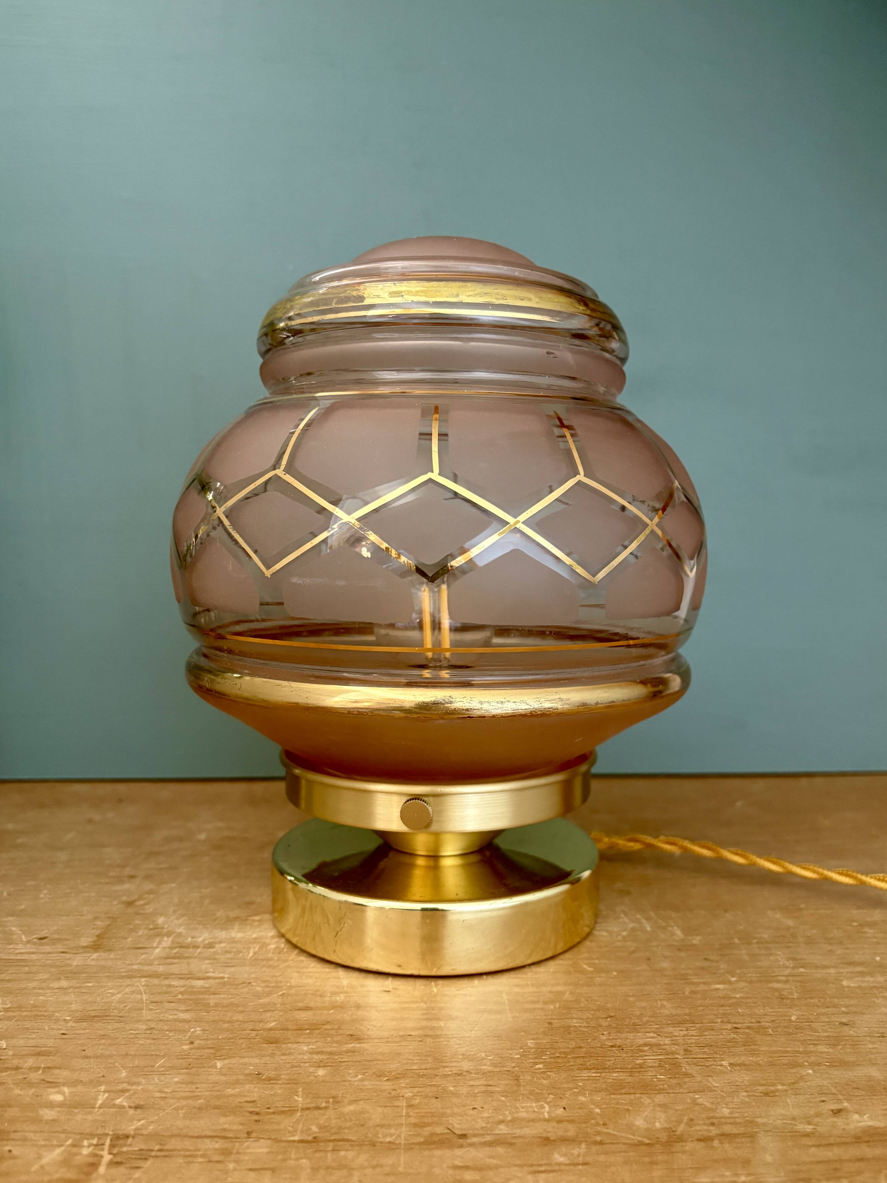 Vintage Art Deco globe table lamp in pink and gold glass.
