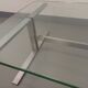 Vintage coffee table in transparent glass and cast aluminum from the 70s