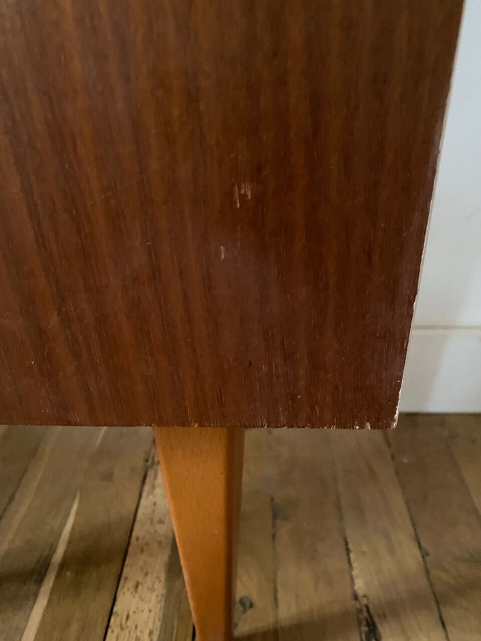 Wooden bedside table and nude