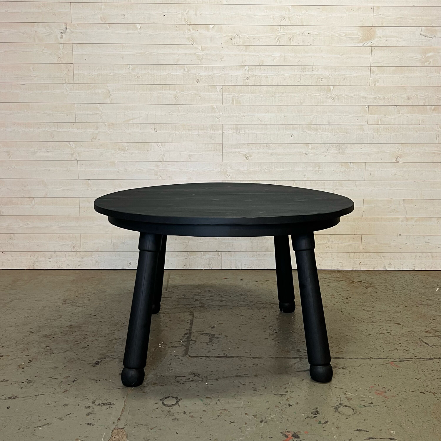 Brutalist round table in burnt wood yakisugi