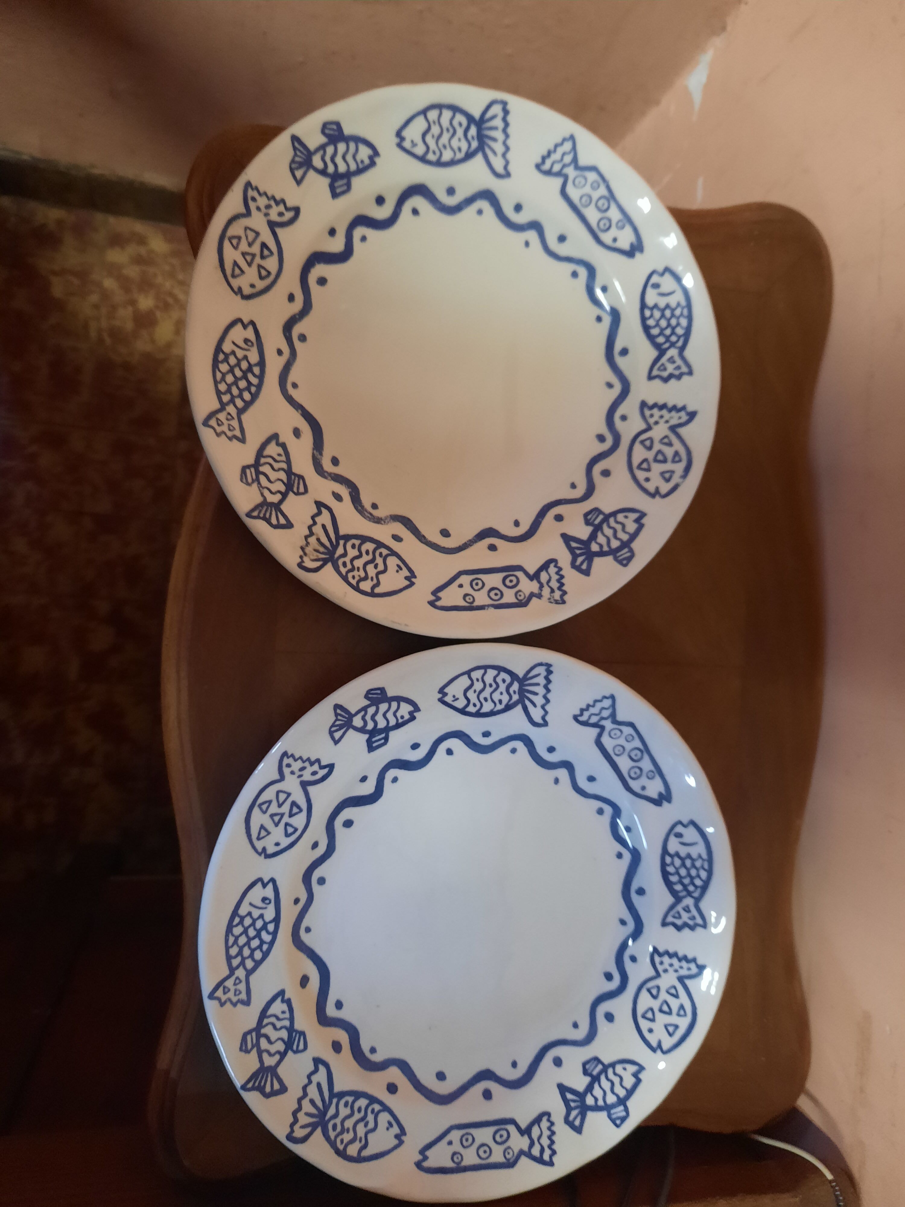 Duo of plates decorated fish
