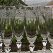 Set of 6 antique crystal champagne flutes. Engraved frieze.