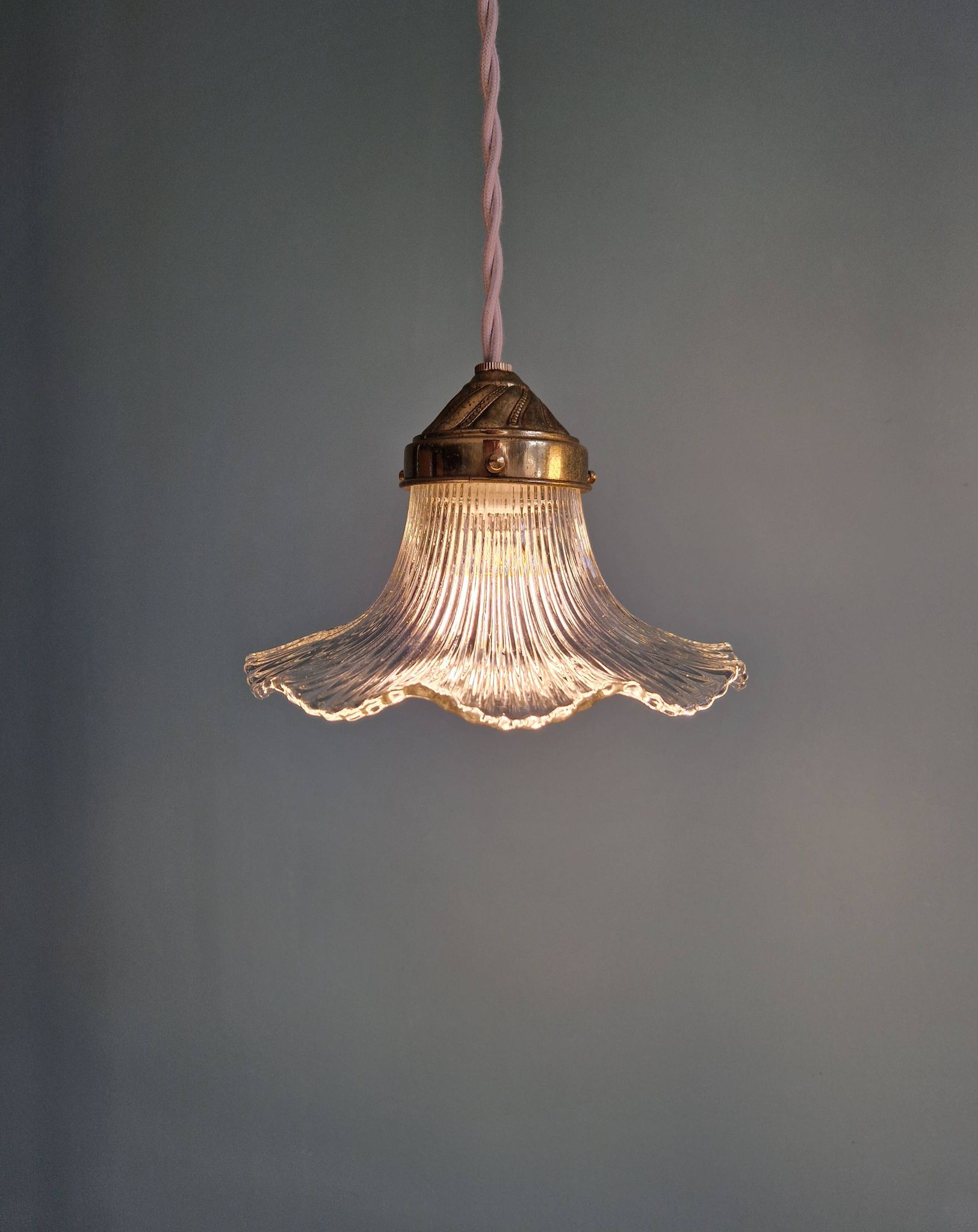 Trio of Art Deco grooved glass pendant lights, 1920s-30s
