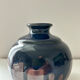 Ink blue round vase and bronze