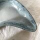 Pair of boomerang dishes signed in enamelled terracotta