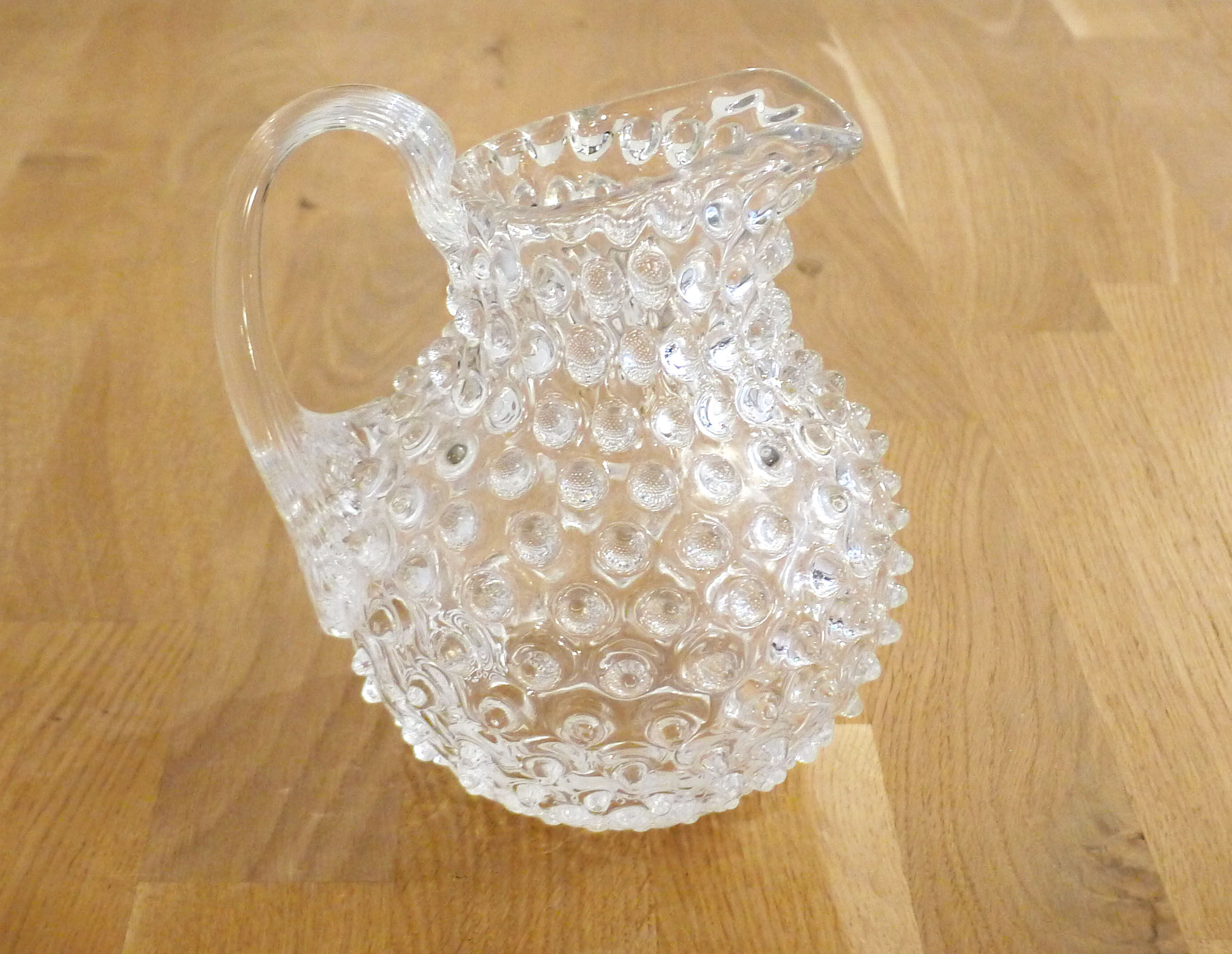 Small pitcher with raised pimples