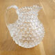 Small pitcher with raised pimples