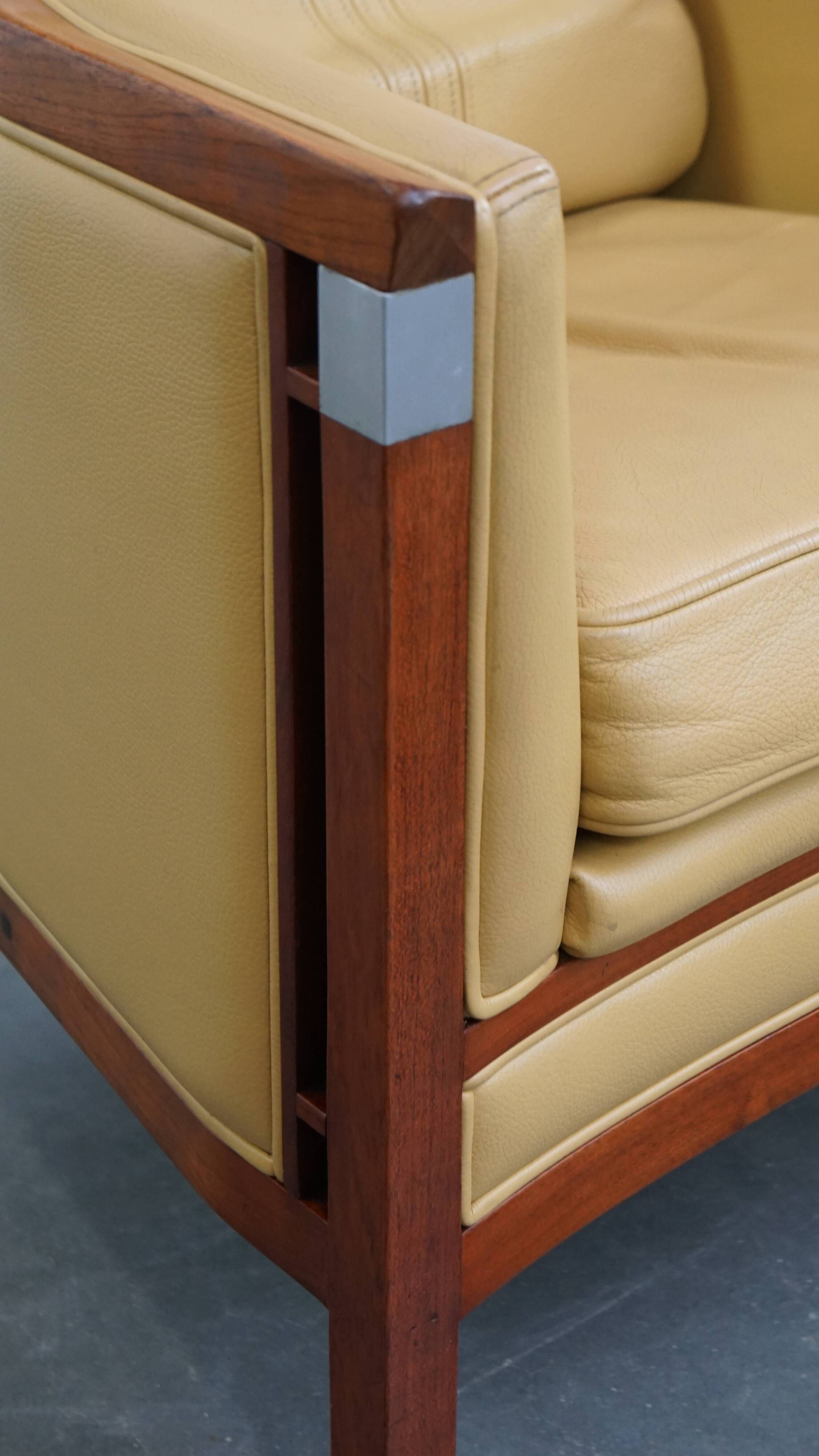 Art Deco armchair in yellow leather with high back