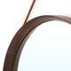 Round mirror with leather strap, 1960s