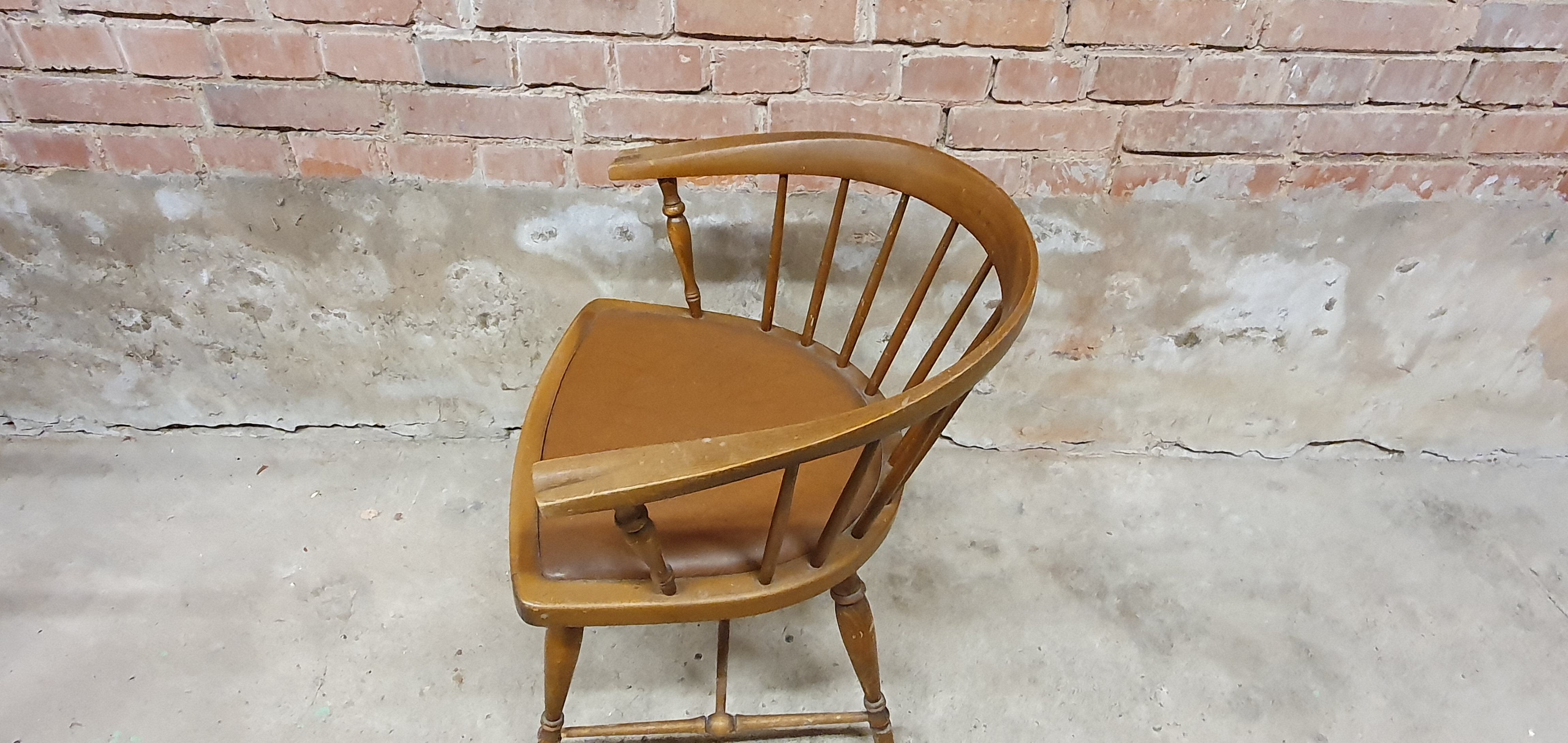 Vintage office armchair with Scandinavian style bar