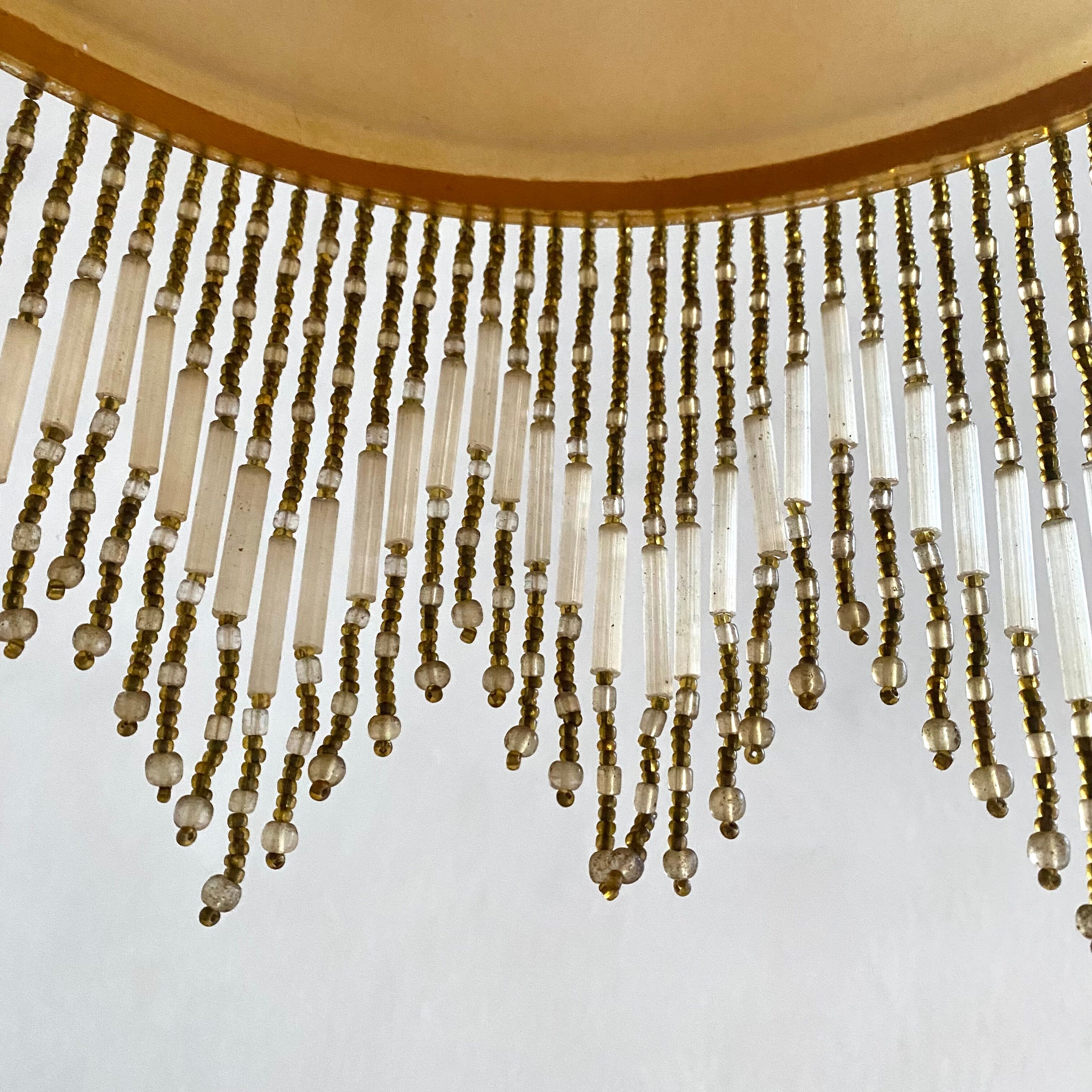 Amber polished glass and pearl suspension