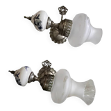 Pair of vintage wall sconces in brass, porcelain, and frosted glass.