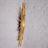 Sun mirror in gilded wood