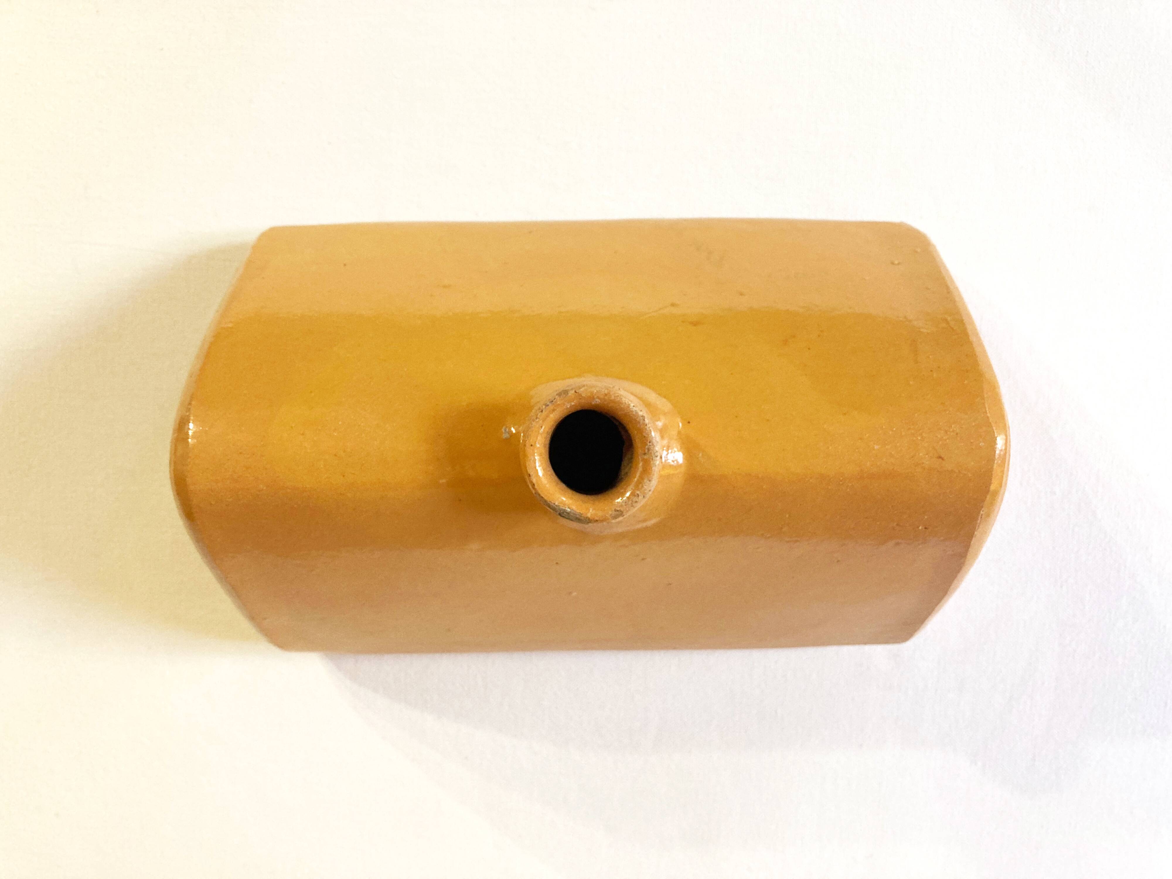 Old sandstone hot water bottle
