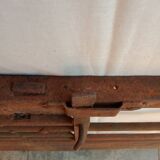 Old riveted metal gate