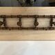 Wooden coat rack with swivel hooks