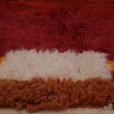 Minimalist burgundy cherry red shaggy berber rug