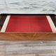 Mid-century drawer chest in mahogany, brass and glass.