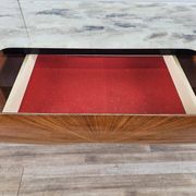 Mid-century drawer chest in mahogany, brass and glass.