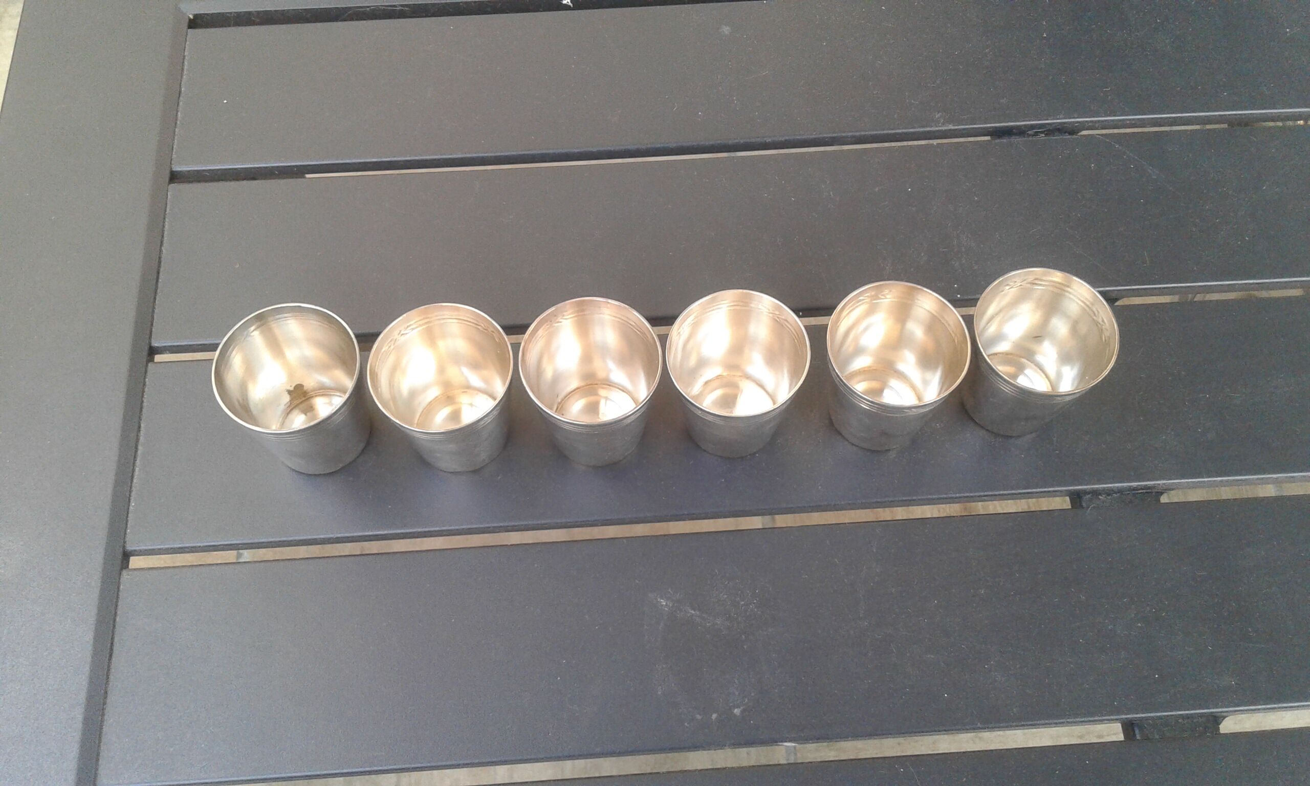 6 small silver glasses for brandy.
