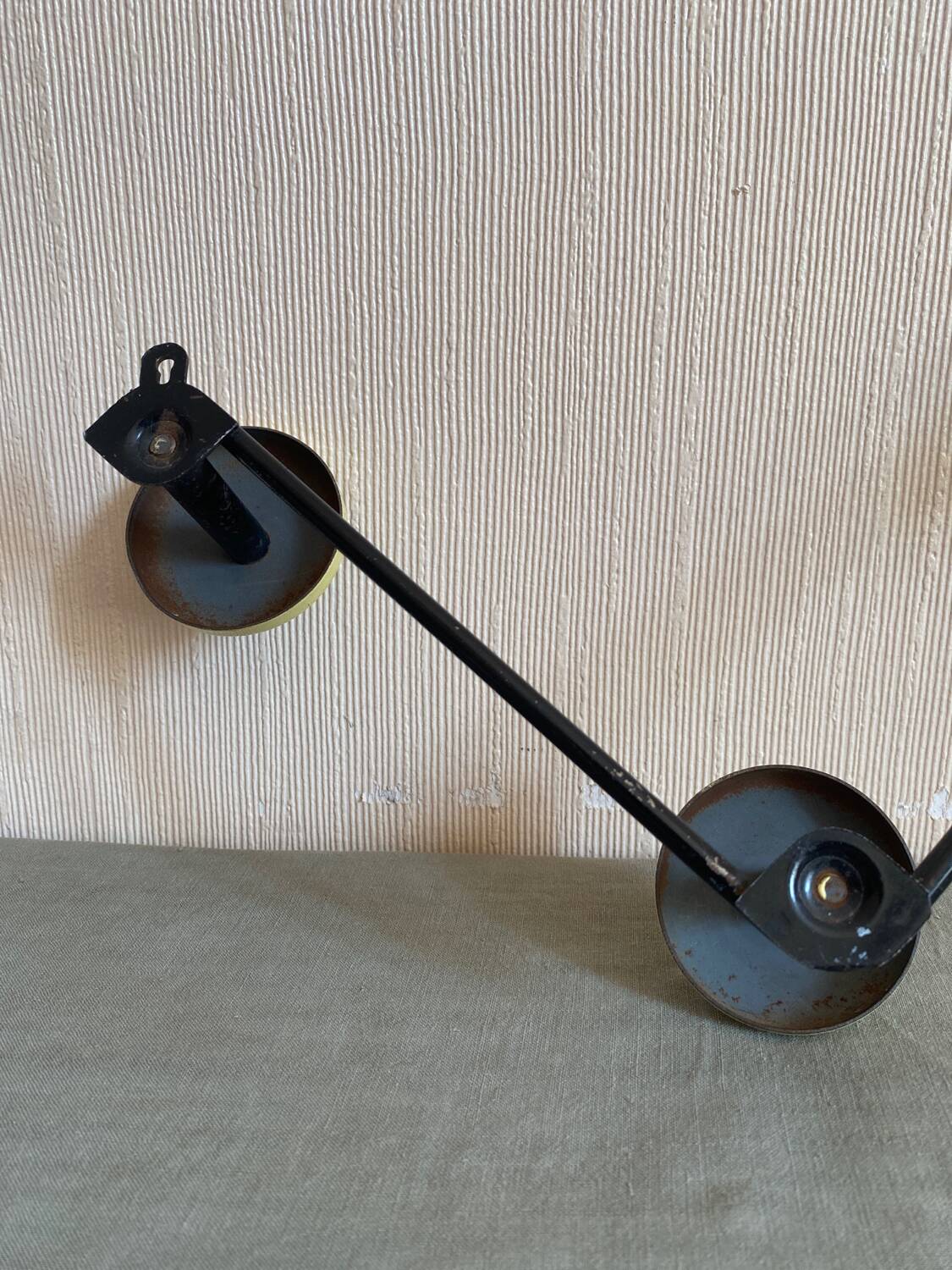 2 black and yellow metal wall coat racks