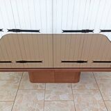 Table basse design en cuir et plateau en verre