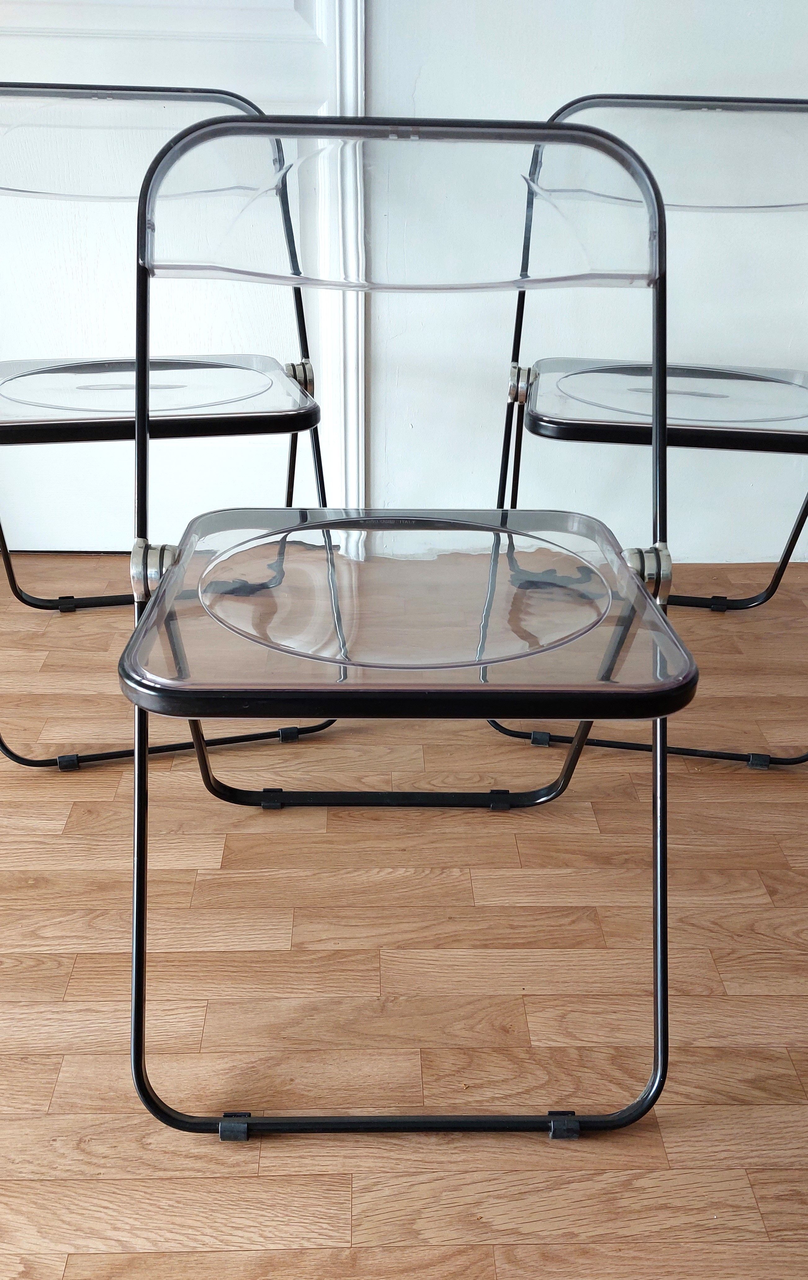 Series of 3 black and transparent Plia chairs Giancalo Piretti for Castelli, 1980.